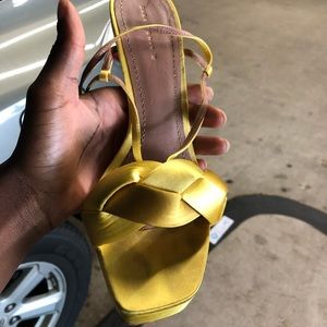 Yellow satin shoes